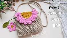 a crocheted bag with flowers on it and the text, part 1 crochet daisy bag