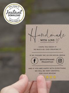 someone holding up a business card with the words handmade with love written on it