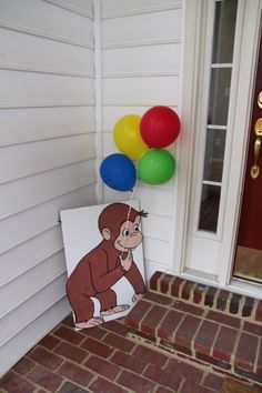 there is a monkey sign on the front porch