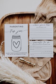 a notepad and pen sitting on top of a wooden tray