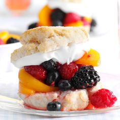 a dessert with fruit and ice cream on it