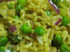 rice with peas and onions on a plate