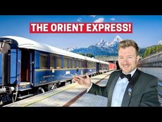 a man in a tuxedo standing next to a train with the words, the orient express