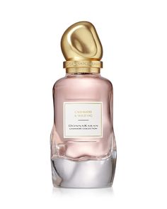 a bottle of perfume on a white background