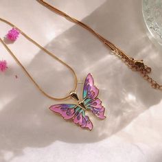 Description:Colorful Enamel Butterfly Necklace Specifications:Material: copper, alloy metal, enamelColors: pink/silver/purple/orangeSize: 44.5 cm + 5 cm extWeight: 6 g/pcs Fly into fashion with our playful Colorful Enamel Butterfly Necklace! Adorned with vibrant enamel and shaped like a butterfly, this necklace is sure to add a touch of whimsy to any outfit. Embrace your wild side and flutter into style today! Magical Stuff, Adorable Style, Kawaii Sanrio, Enamel Butterfly, Fashion Girly, Flying Flowers, Color Making, Environmental Friendly, Enamel Bracelet