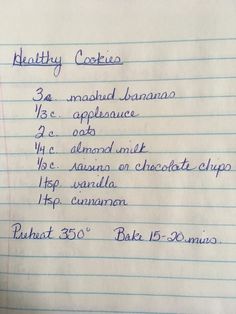 a handwritten recipe for healthy cookies on lined paper with blue marker writing in english