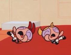 two cartoon characters are laying on the floor