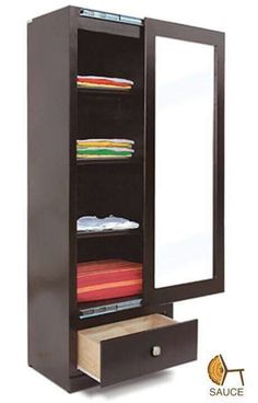 a black cabinet with mirror and drawers underneath it