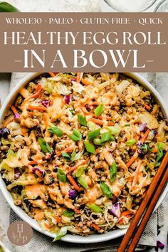 an egg roll in a bowl with chopsticks next to it and the title