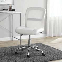 a white office chair sitting on top of a rug