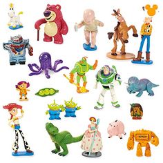 various toy figurines are displayed on a white background