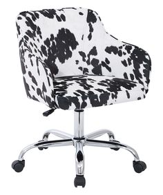 a black and white cow print office chair