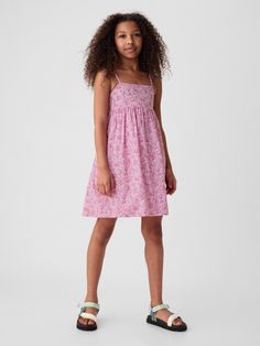 Soft woven dress.  Square neckline.  Spaghetti straps.  Smocked back with cutout detail.  Assorted allover floral prints.  Note: Our Blue White Floral style is made with a linen-blend.  Fit and flare silhouette.  Hits at the knee. Summer Photo Outfits, Kids Floral Dress, Floral Dress Pink, Flower Girl Tutu, Pink Floral Dress, Workwear Dress, Tween Outfits, Gap Kids, Swimwear Cover Ups