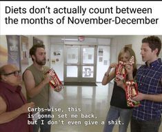 three people are standing in a room holding candy bars and looking at each other with the caption diets don't actually count counts between the months of november - december