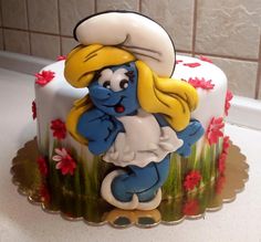 there is a cake that looks like the smurfs character