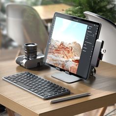 a desktop computer sitting on top of a wooden desk next to a keyboard and mouse