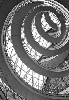 the inside of a building with many circular windows