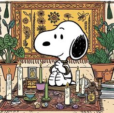 a cartoon snoopy sitting on top of a rug next to candles and potted plants