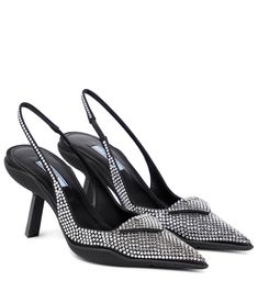 Prada updates its signature slingback pumps with festive crystal embellishments. Set on sporty rubber soles and slanted stiletto heels, this satin pair features sharp-pointed toes. Prada Shoes Heels, Jeweled Shoes, Embellished Heels, Crystal Heels, Jeweled Sandals, Rhinestone Shoes, Crystal Shoes, Prada Shoes, Sneaker Heels