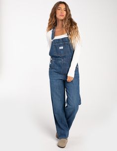 Levi's No Hippies Vintage Overalls. Made From A Durable Cotton-Rich Fabric, These Vintage-Inspired Overalls Have All The Familiar Features You Love Creating An Authentic Look From Top To Bottom. Better With Age And Wear, This Classic Workwear Essential Has Already Become Our Closet Staple To Transition Through The Seasons. Adjustable Straps. Multiple Pockets For Storage. Relaxed Through Your Hip And Thigh. Approx. Inseam: 28''. 100% Cotton. Machine Wash. Imported. Model Is Wearing A Size Small. Levi Overalls Outfit, Overalls Women Outfits, Fall Overall Outfits, Long Overalls Outfit, Carhartt Overalls Outfit, 90s Overalls Outfit, Black Overalls Outfit, Styling Overalls, Overalls Outfit Summer