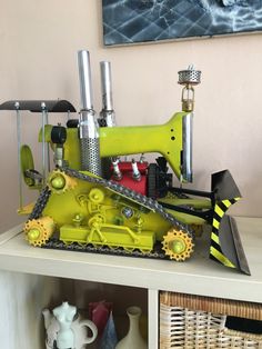 a toy tractor sitting on top of a shelf