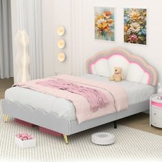 a child's bedroom with pink and gray furniture