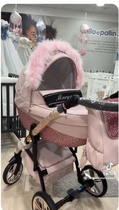 a baby stroller with pink fur on it