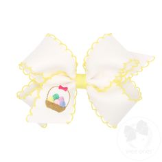 This unique hair bow for girls features colorful embroidered Easter basket on the tail of a white grosgrain girls hair bow with contrasting moonstitch for an accessory that is sure to delight. This bow is sure to stay in her hair all day with our patented WeeStay™ no-slip hair clip. Embroidered Easter Basket, Unique Hair Bows, Easter Hair Bows, Girls Hair Bow, Easter Bows, Easter Embroidery, Easter Hair Bow, Unique Hair, Bow Accessories