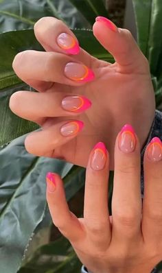 Nails Design Summer - Neon Ombre Tips: Clear nails featuring a striking ombre effect in neon pink and orange hues. This dynamic and eye-catching design is perfect for adding a pop of color and flair to any outfit. Kos, Neon Nails Different Colors, Bright Neon Summer Nails, Vibrant Nail Ideas, Cute Summer Vacation Nails, Summer Nail Tips Ideas, Gel Nails Summer Colors, Neon Colors Nails, Cute Neon Nail Ideas