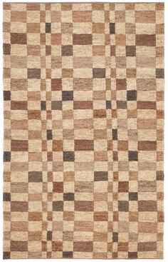 a brown and black rug with squares on the bottom, in different shades of beige