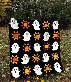 a quilt made to look like ghost heads