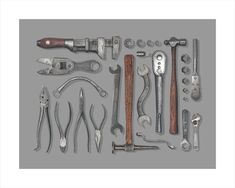 an assortment of tools displayed in a wooden frame on a gray background, including hammers, pliers and wrenches
