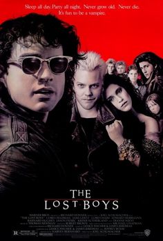 the lost boys movie poster with an image of two men wearing sunglasses and one man in black