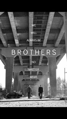 two men walking under an overpass with the words brothers no matter what