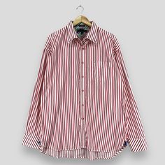 TOMMY HILFIGER Stripes Flannel Xlarge Vintage 90s Tommy Jeans Vertical Red/White Stripes Flannel Tommy Casual Button Up Office Shirt Size XL *All measurements are taken with the garment flat on the ground. SIZE ON TAG :- Size XL ACTUAL SIZE MEASUREMENT :- ARM PIT TO ARM PIT :- 26" inches BACK COLLAR TO HEM :- 31" inches CONDITION :- GREAT USED CONDITION. NO HOLES AND STAINS. REF : (22-06-2021) R12 Red White Striped Shirt, Red White Stripes, Red Striped Shirt, Office Shirt, Button Up Shirt Mens, The Office Shirts, Red And White Stripes, Red Stripes