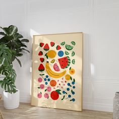 a painting on the wall next to a potted plant and a vase filled with watermelon