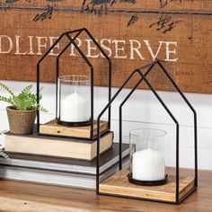 Crafted from wood and metal, this beautiful set of open, lantern-style candle holders are capable of accommodating most common-sized candles and look great in any space and setting. | Loon Peak® 2 Piece Tabletop Lantern Set 11.81 H x 6.0 W x 8.0 D in brownWood / Metal in Brown / Black | 11.81" H X 6" W X 8" D | Wayfair Open Lantern, Table Candle Holders, Table Candle, Wire Creations, Planter Wall, Marble Candle Holder, Small Candle Holders, Modern Candle Holders, Marble Candle