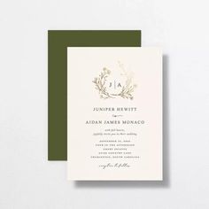 an elegant black and white wedding card with the initials jja on it, in gold foil