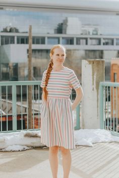 This modest dress has stripes. It has pastel colors- pink, blue, and white. Women can wear it in the spring. It has pockets and is midi. Buy now! #stripeddress #modest Pastel, Black Cocktail Party Dress, Striped Dresses, Church Dress