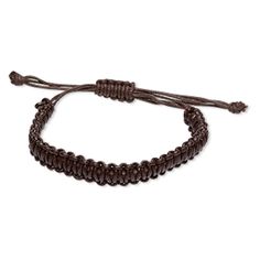 a brown string bracelet with beads