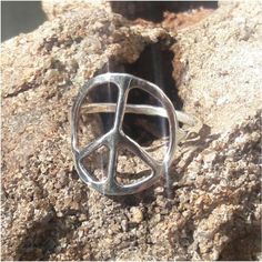 Silver peace sign rings are made by Old Hippie Dave in Safety Harbor, Florida. Each one is hand fabricated out of 925 sterling silver and hand polished. Custom made to your size with 14 gage band. Because this ring is handmade no 2 rings are ever exactly the same. Safety Harbor Florida, Peace Sign Ring, Peace Sign Jewelry, Hippie Rings, Jewelry Chest, Nail Jewelry, Ring Shapes, Hippie Jewelry, Great Christmas Gifts