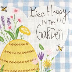 bee happy in the garden with flowers and bees on it's back side, next to a blue gingham checkerboard background