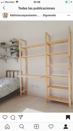 a bed and some shelves in a room