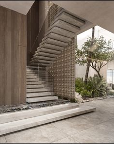 a staircase leading up to the top floor of a house