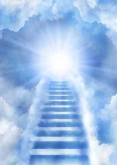 a stairway leading up into the sky with clouds
