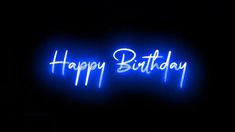 a blue neon sign that says happy birthday in white writing on a black background with the word