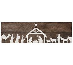 a nativity scene with the birth of jesus and three wise men in silhouettes