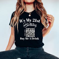 Introducing our Personalized 21st Birthday "Buy Me A Drink" QR Code T-Shirt, the ultimate statement piece for your milestone celebration. Crafted with comfort and style in mind, this shirt is perfect for your birthday festivities.

Featuring your name and age, this shirt ensures that you stand out as the life of the party on your 21st birthday. With its humorous "Buy Me A Drink" QR code, it's sure to attract attention and add an element of fun to your celebration.

Designed for the birthday team 21st Birthday T Shirts Ideas, 21st Bday Shirts, 21st Birthday Shirt Ideas, 21 Birthday Shirts, 21st Birthday Shirt, Birthday Group Shirts, Birthday Festivities, 21st Birthday Shirts, Vegas Birthday