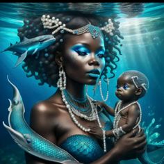 a woman holding a baby under the water