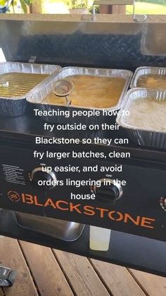 three pans of food sitting on top of an outdoor grill that says blackstone